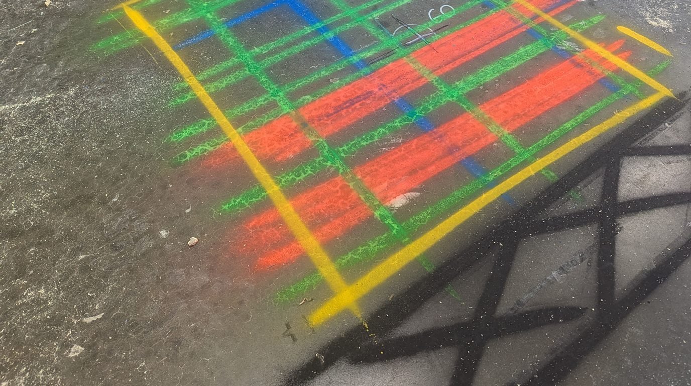 Close view of a GPR scan grid with orange bands marked on a concrete slab